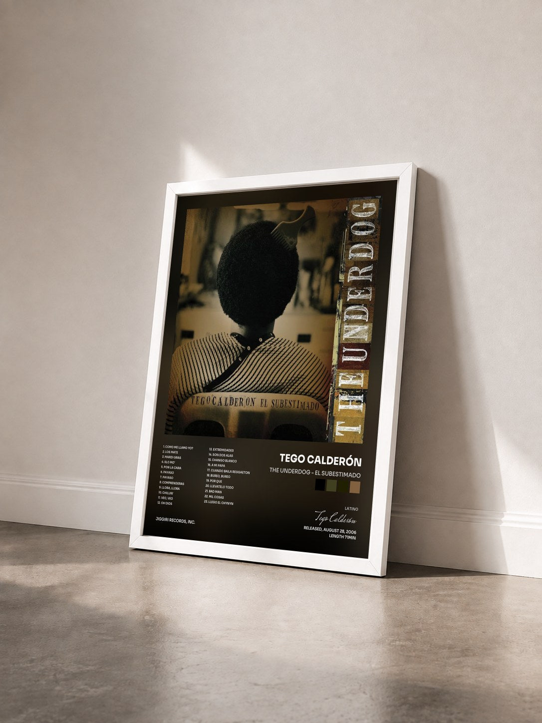 #blanc Tableau de l'album The Underdog - El Subestimado de Tego Calderón vu de trois quarts, cadre blanc