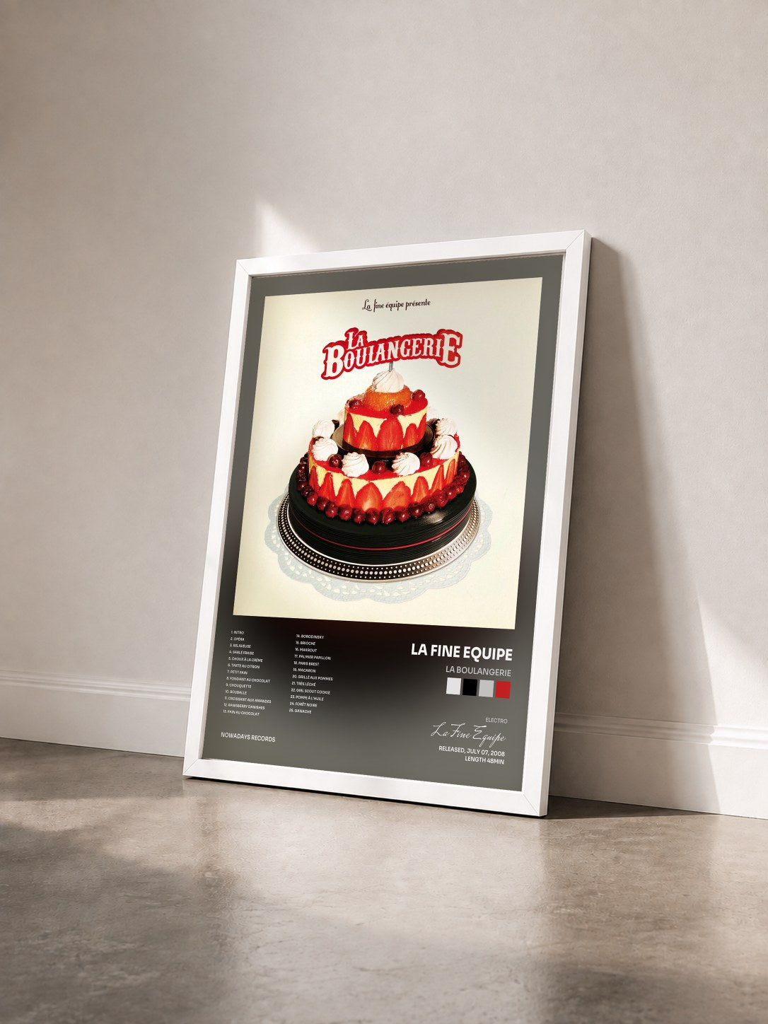 #blanc Tableau de l'album La Boulangerie de La Fine Equipe vu de trois quarts, cadre blanc