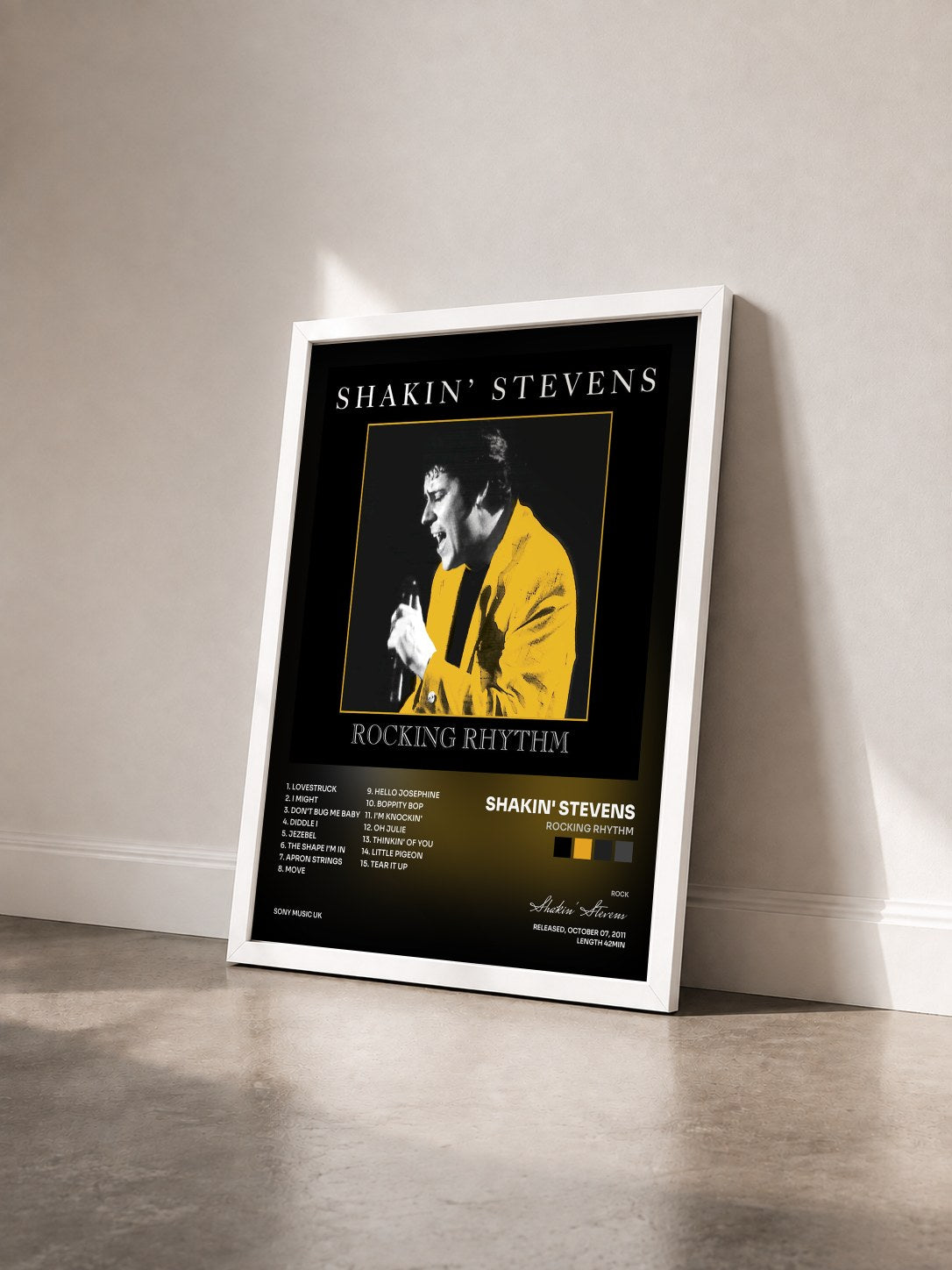 #blanc Tableau de l'album Rocking Rhythm de Shakin' Stevens vu de trois quarts, cadre blanc