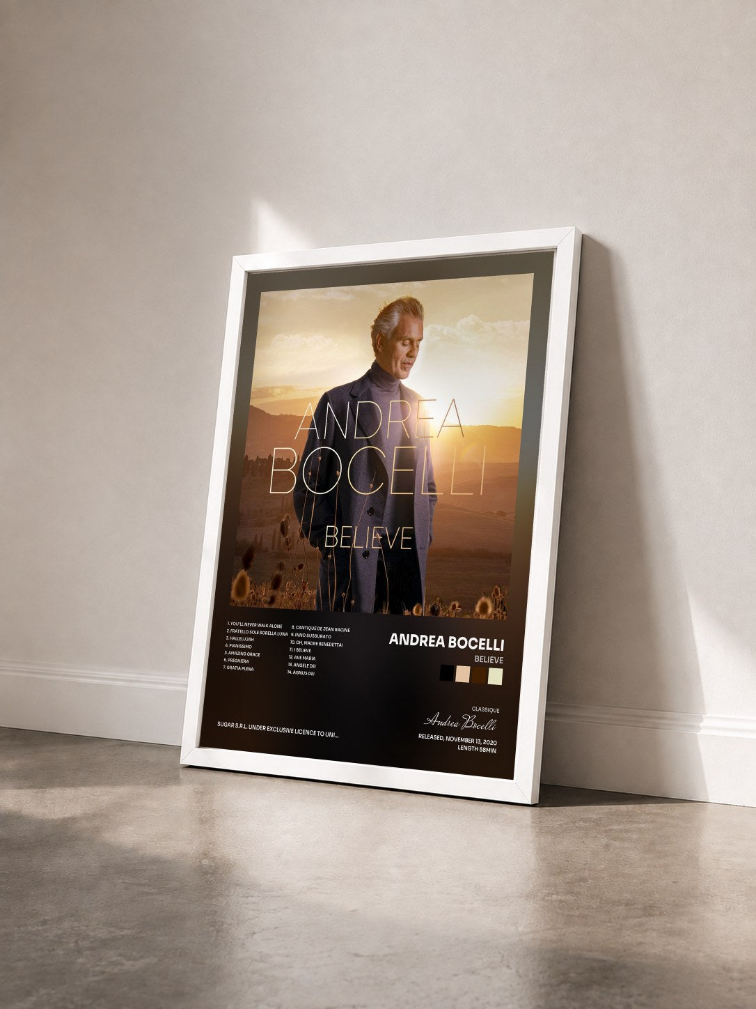 #blanc Tableau de l'album Believe de Andrea Bocelli vu de trois quarts, cadre blanc