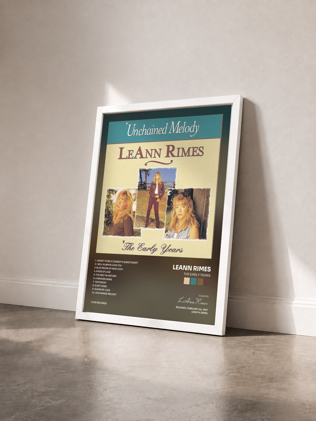#blanc Tableau de l'album The Early Years de LeAnn Rimes vu de trois quarts, cadre blanc