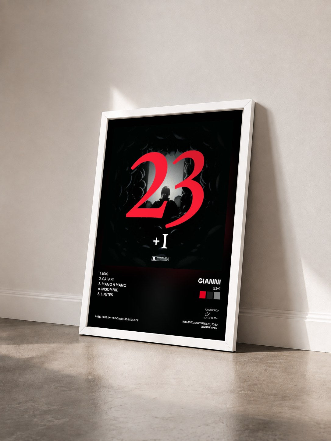 #blanc Tableau de l'album 23+1 de Gianni vu de trois quarts, cadre blanc