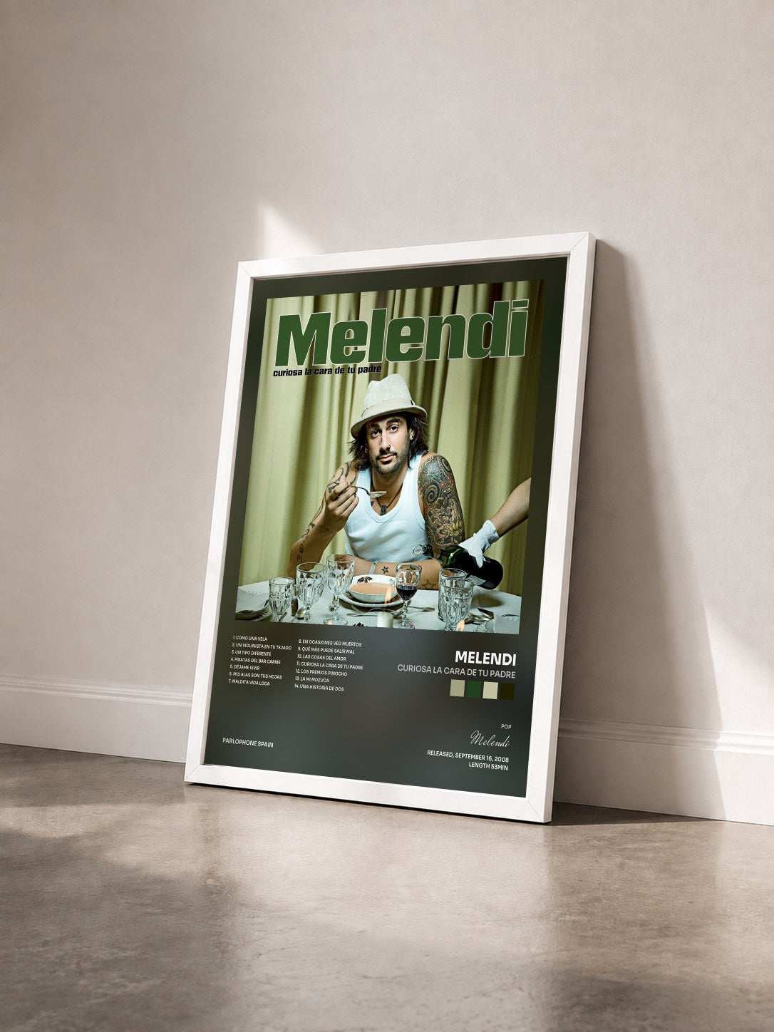 #blanc Tableau de l'album Curiosa La Cara De Tu Padre de Melendi vu de trois quarts, cadre blanc
