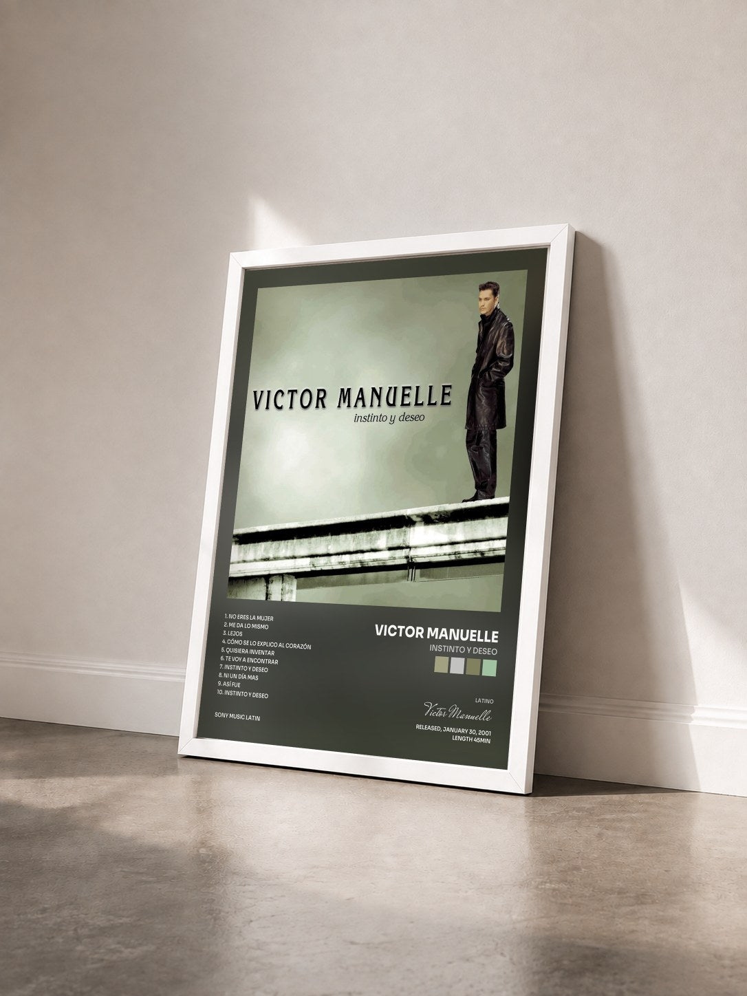 #blanc Tableau de l'album Instinto Y Deseo de Victor Manuelle vu de trois quarts, cadre blanc
