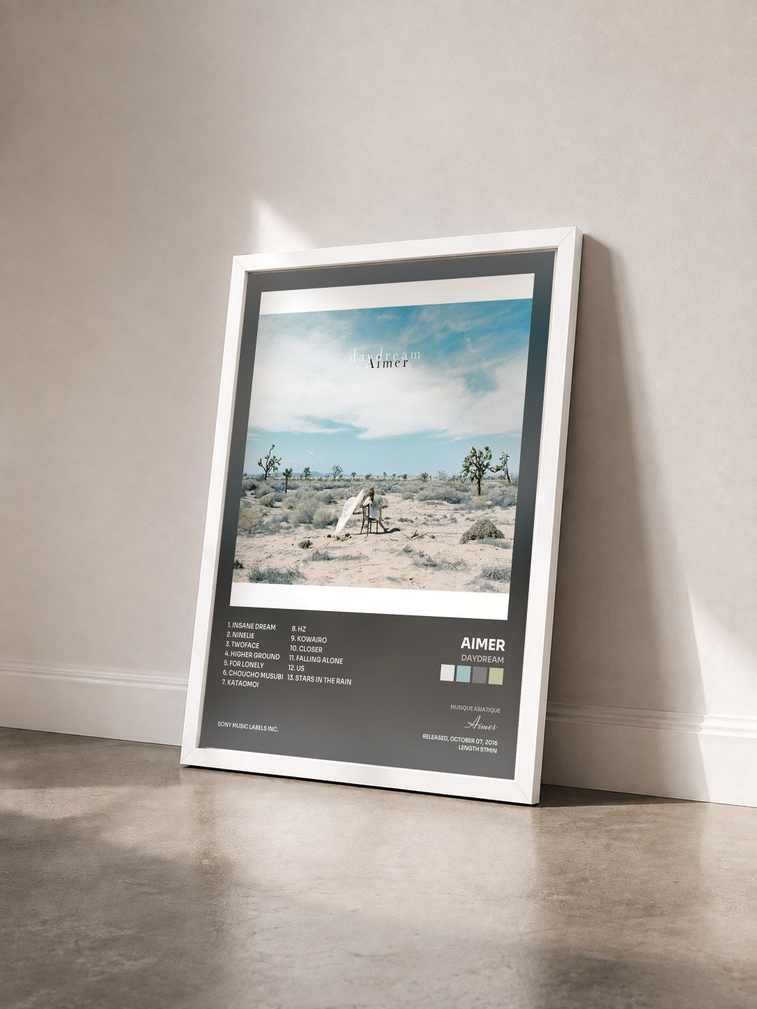 #blanc Tableau de l'album daydream de Aimer vu de trois quarts, cadre blanc