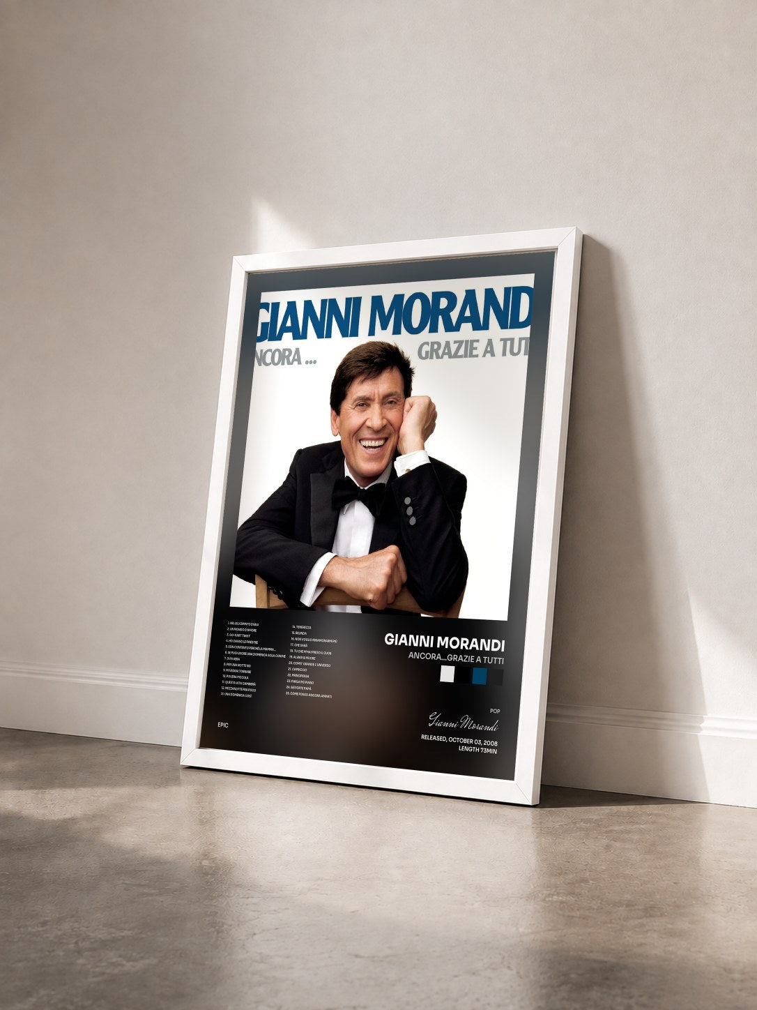 #blanc Tableau de l'album Ancora...Grazie A Tutti de Gianni Morandi vu de trois quarts, cadre blanc
