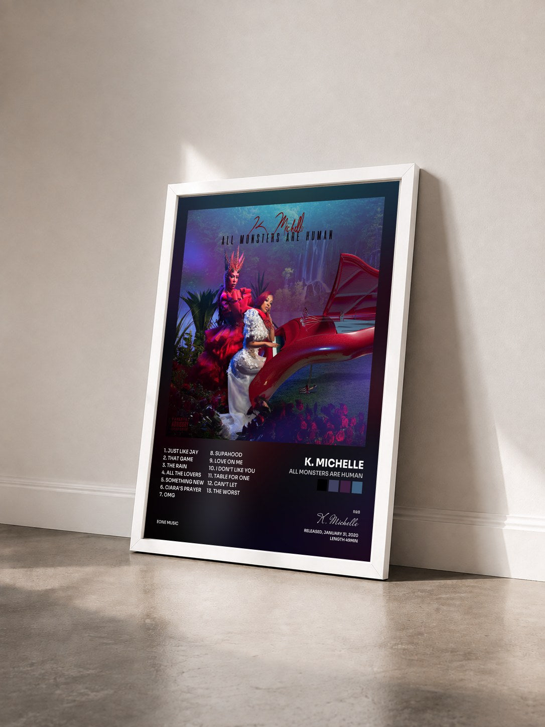 #blanc Tableau de l'album All Monsters Are Human de K. Michelle vu de trois quarts, cadre blanc