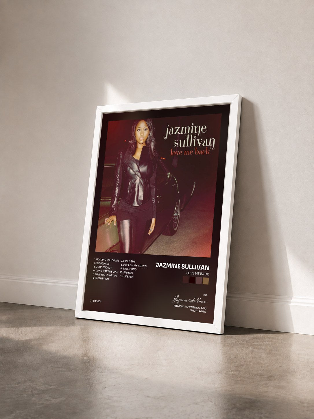#blanc Tableau de l'album Love Me Back de Jazmine Sullivan vu de trois quarts, cadre blanc