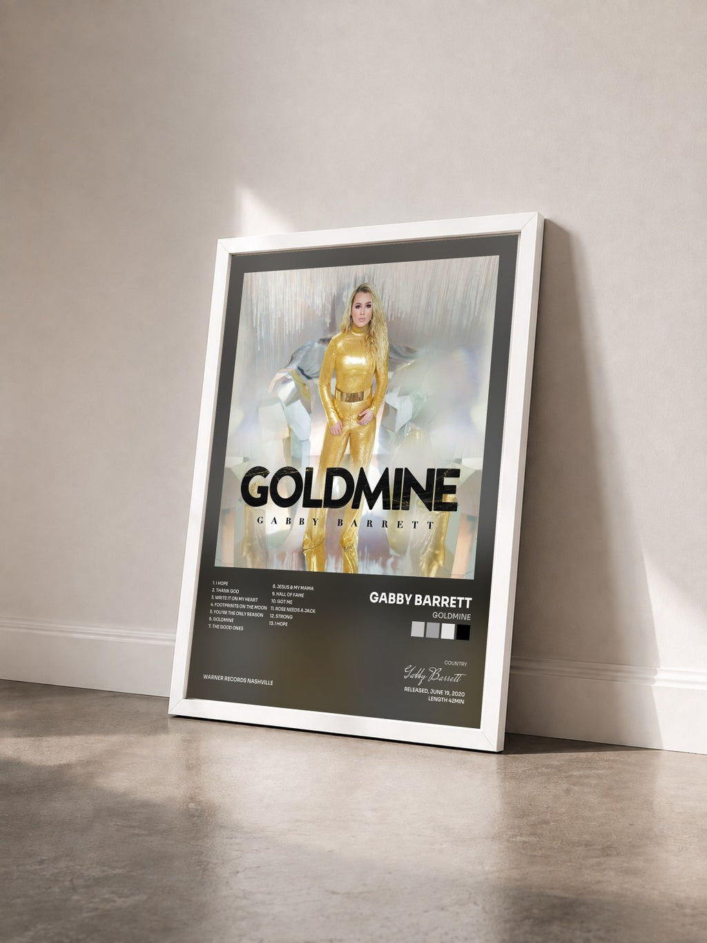 #blanc Tableau de l'album Goldmine de Gabby Barrett vu de trois quarts, cadre blanc