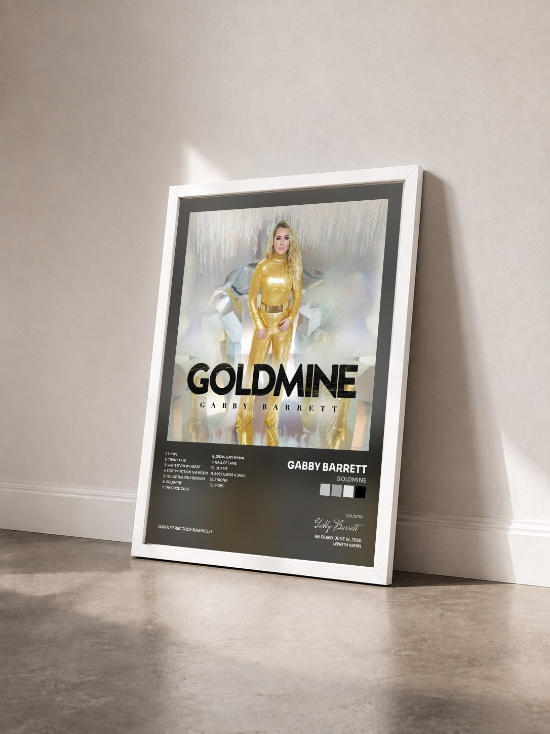 #blanc Tableau de l'album Goldmine de Gabby Barrett vu de trois quarts, cadre blanc