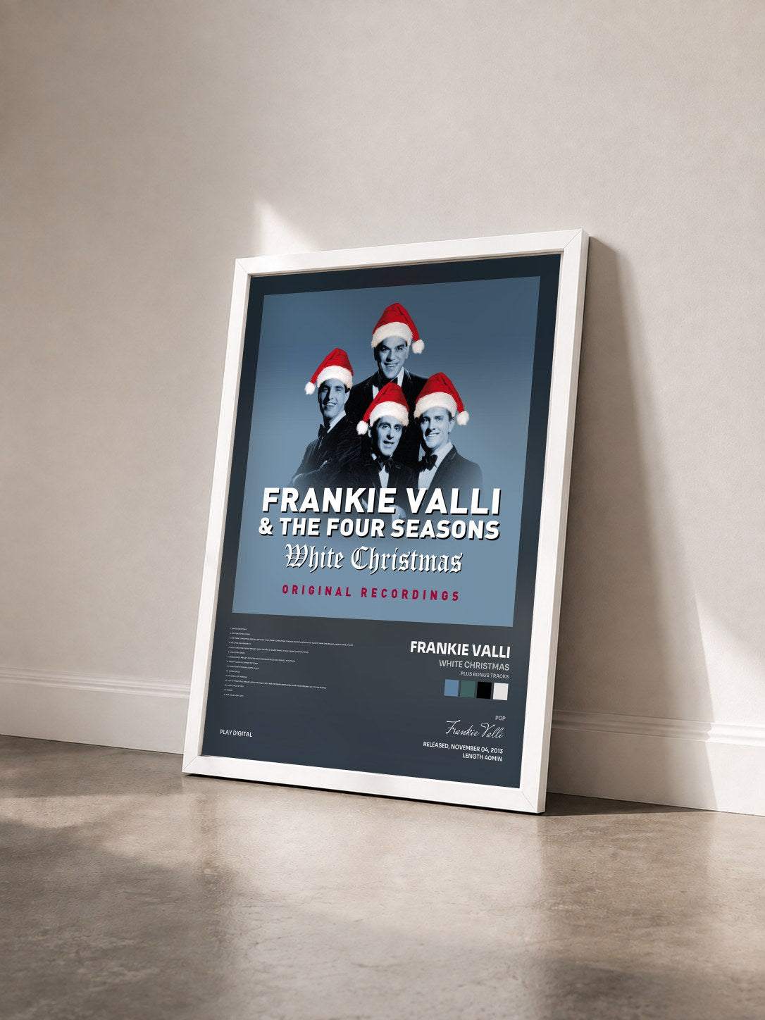 #blanc Tableau de l'album White Christmas (Plus Bonus Tracks) de Frankie Valli vu de trois quarts, cadre blanc