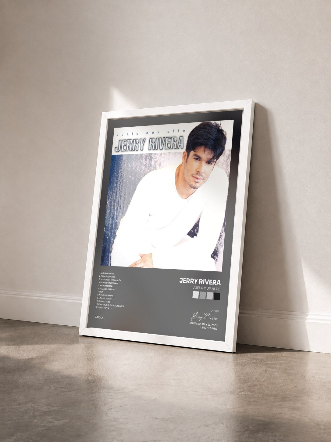 #blanc Tableau de l'album Vuela Muy Alto de Jerry Rivera vu de trois quarts, cadre blanc
