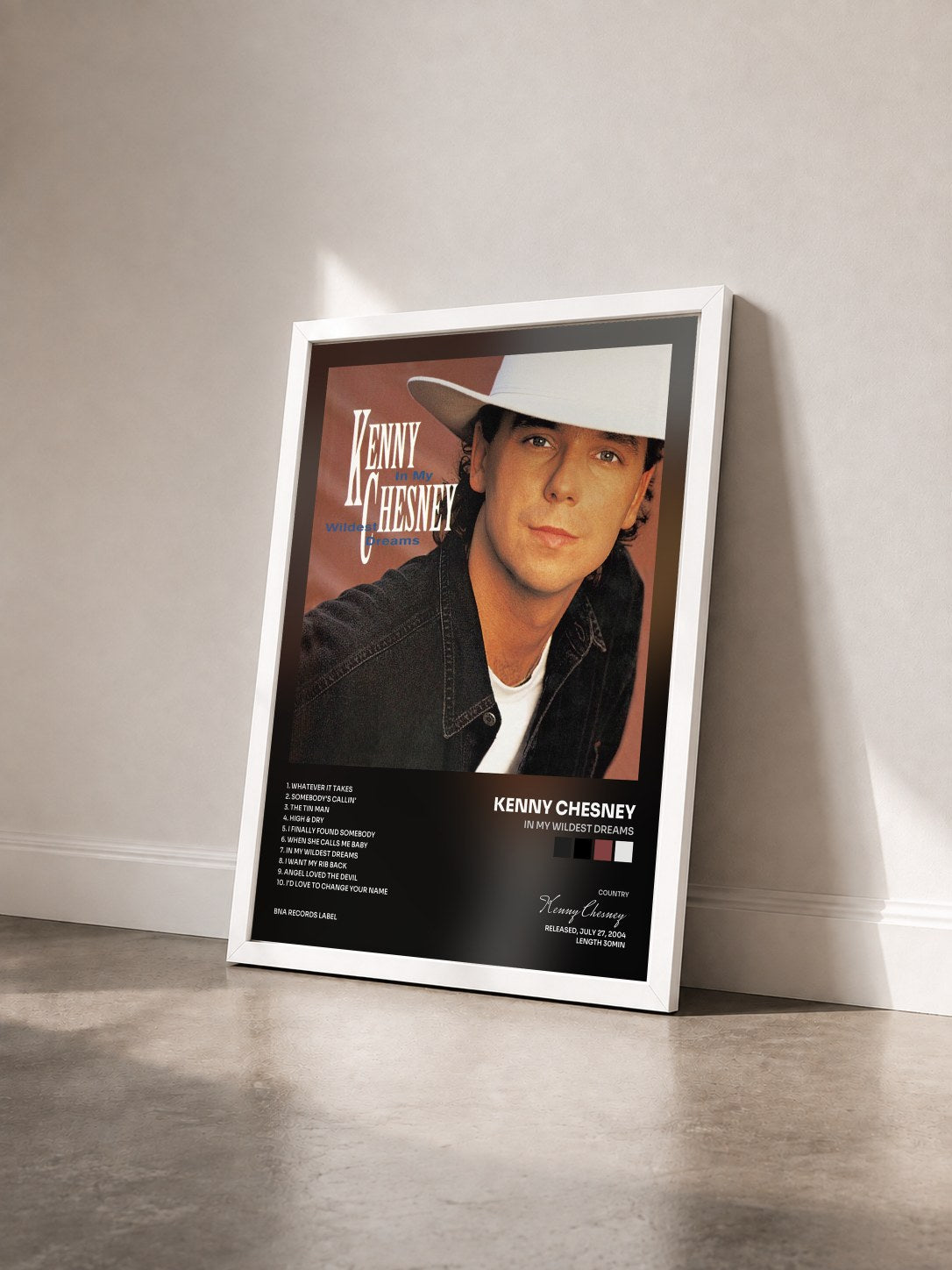 #blanc Tableau de l'album In My Wildest Dreams de Kenny Chesney vu de trois quarts, cadre blanc