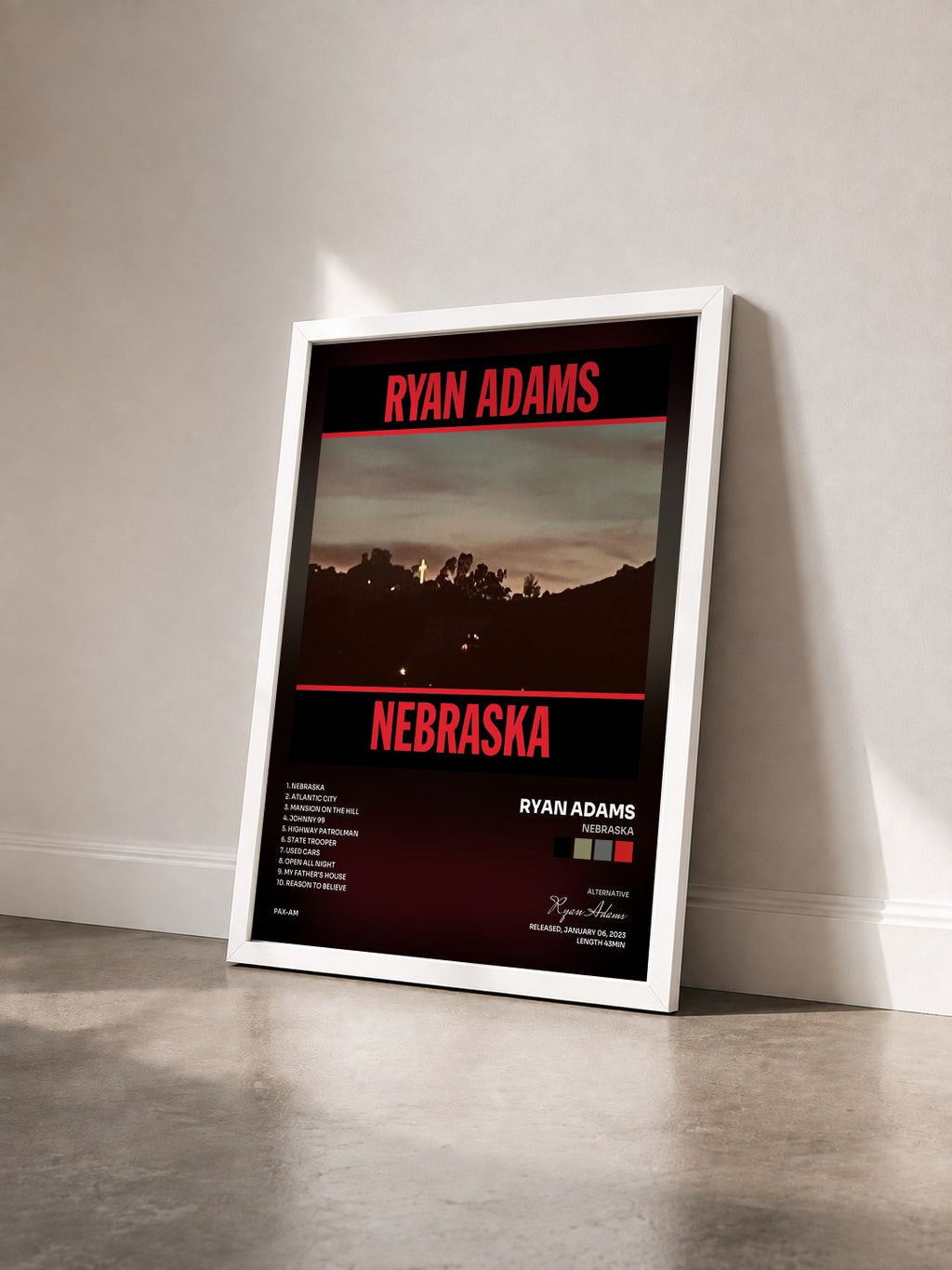 #blanc Tableau de l'album Nebraska de Ryan Adams vu de trois quarts, cadre blanc