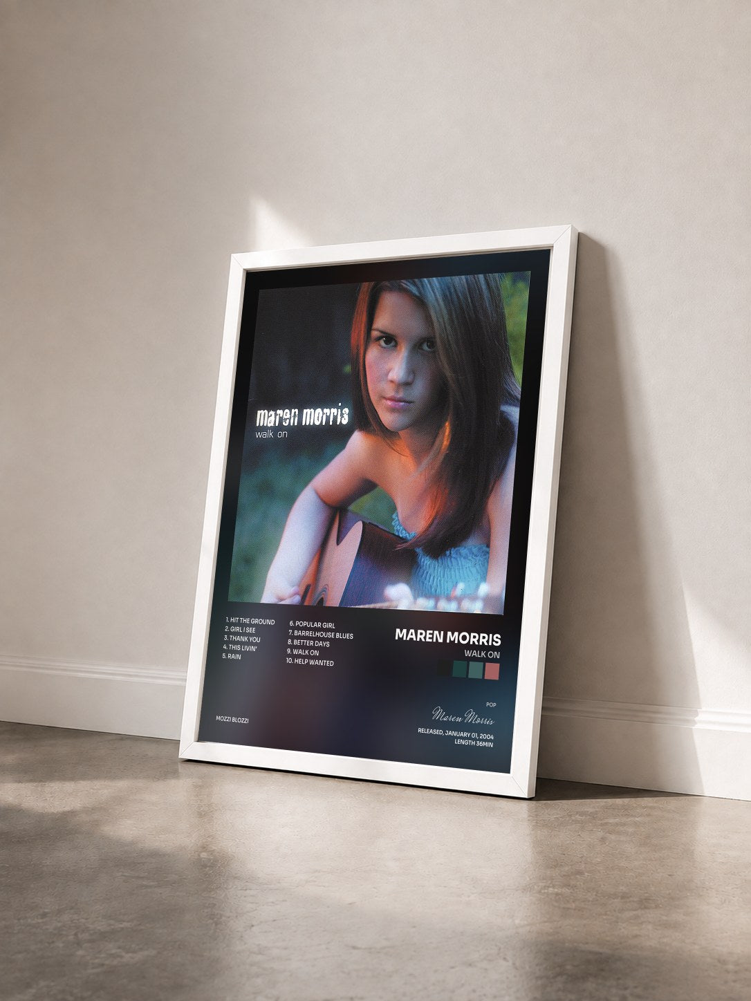 #blanc Tableau de l'album Walk On de Maren Morris vu de trois quarts, cadre blanc
