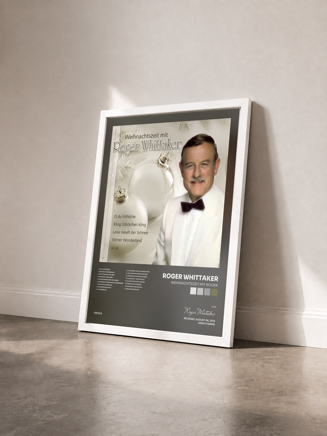 #blanc Tableau de l'album Weihnachtszeit mit Roger de Roger Whittaker vu de trois quarts, cadre blanc