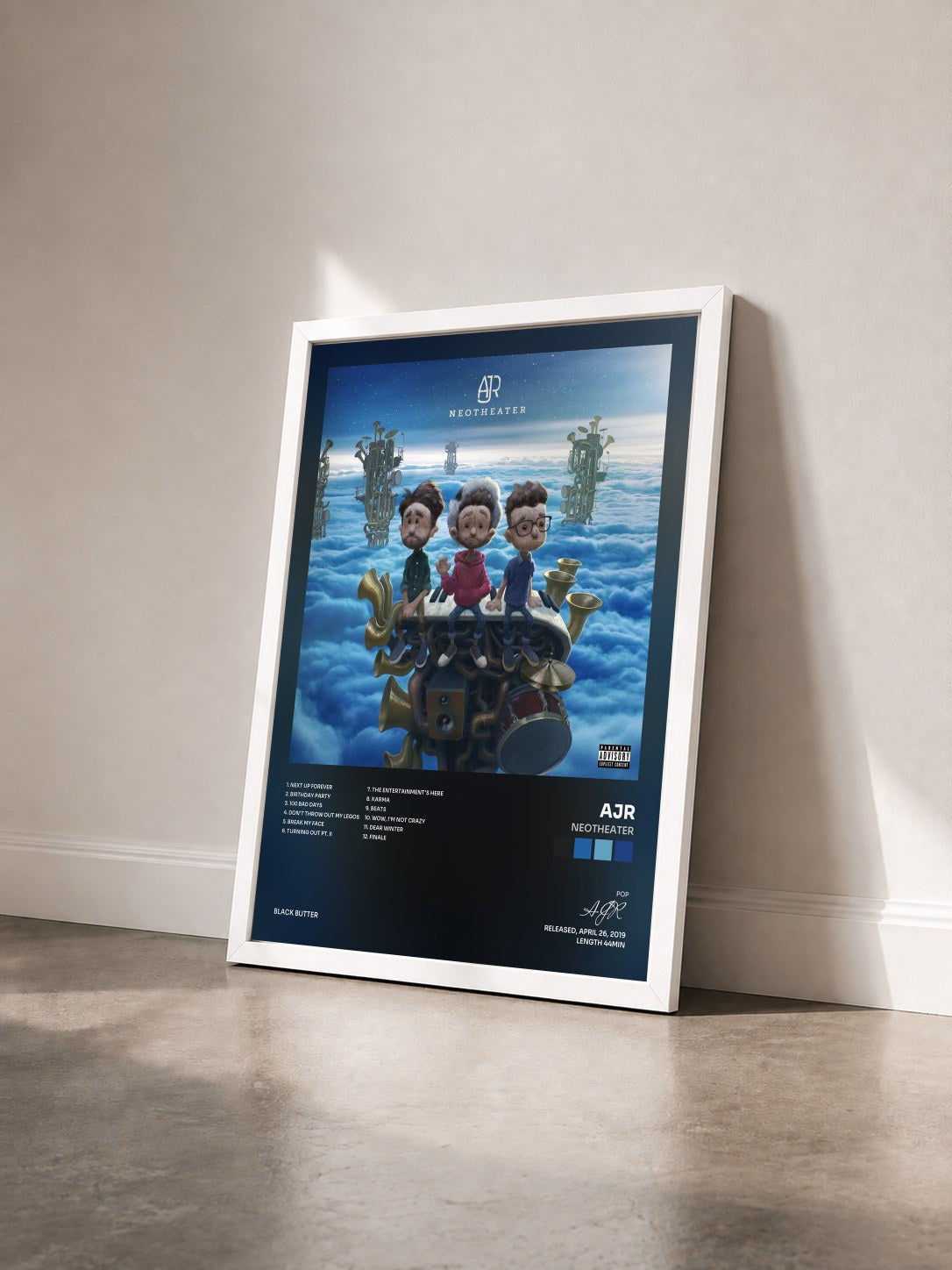 #blanc Tableau de l'album Neotheater de AJR vu de trois quarts, cadre blanc