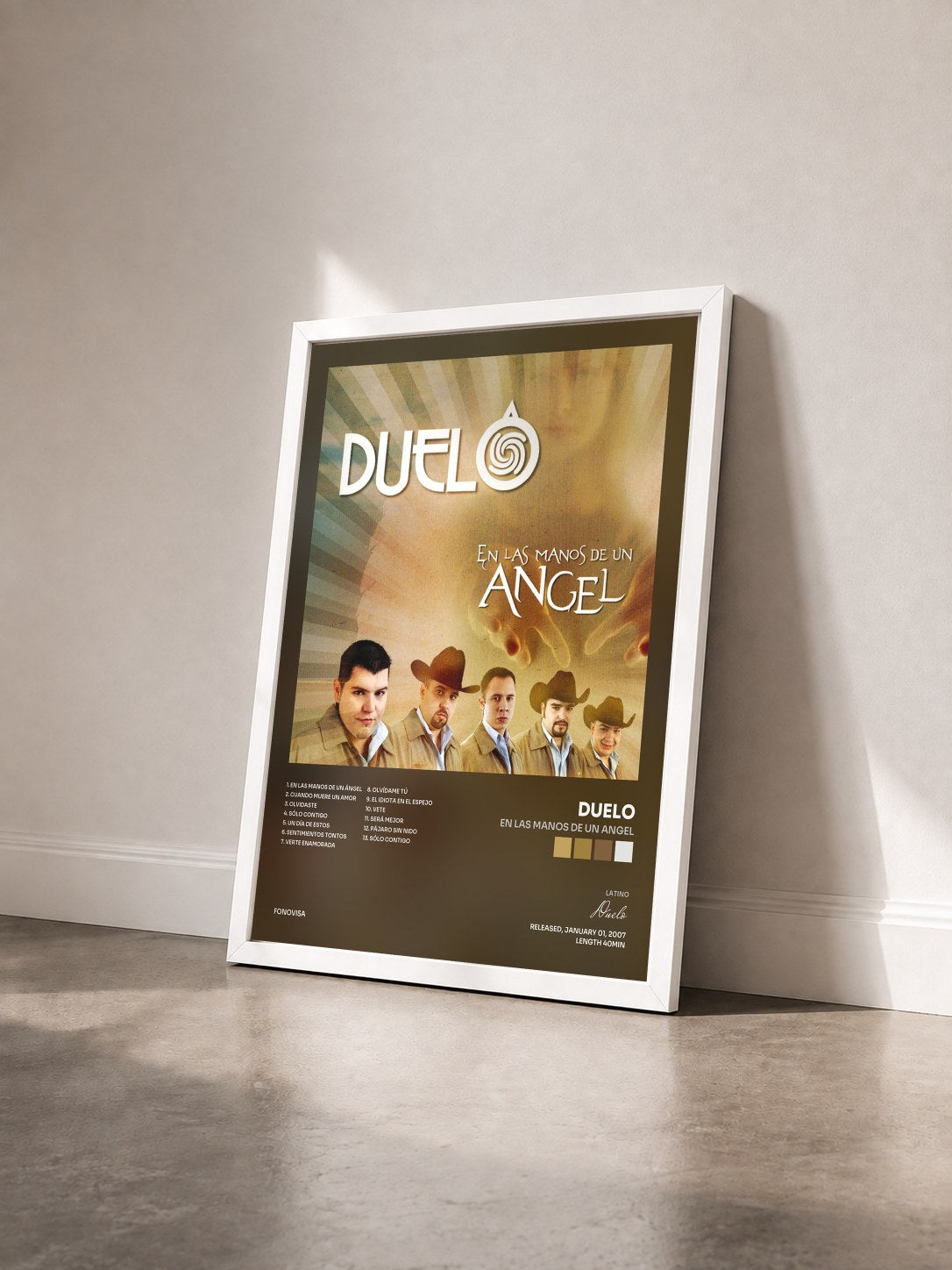 #blanc Tableau de l'album En Las Manos De Un Angel de Duelo vu de trois quarts, cadre blanc