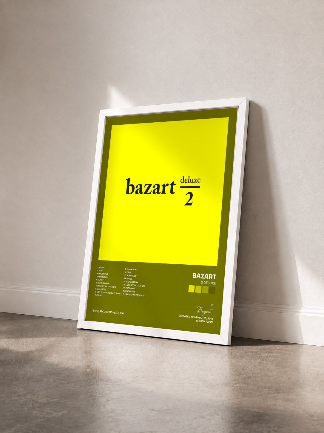 #blanc Tableau de l'album 2 DELUXE de Bazart vu de trois quarts, cadre blanc