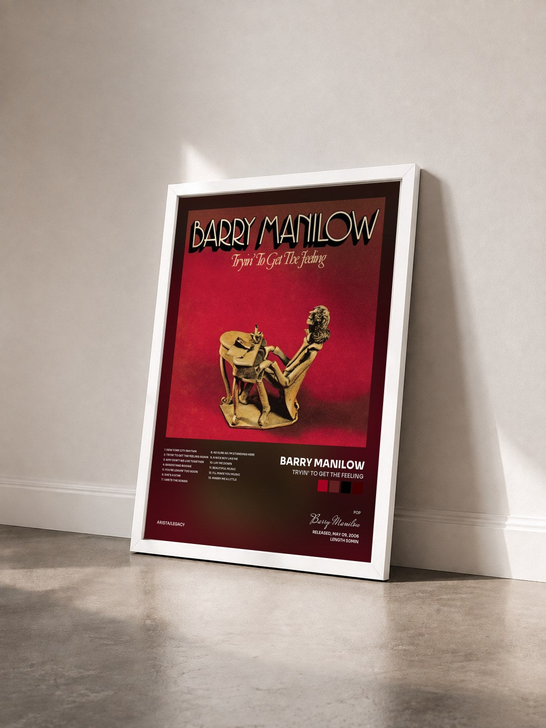 #blanc Tableau de l'album Tryin' To Get The Feeling de Barry Manilow vu de trois quarts, cadre blanc