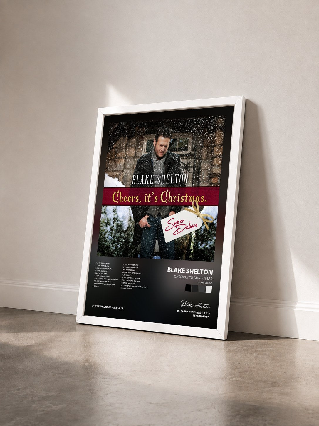 #blanc Tableau de l'album Cheers, It's Christmas (Super Deluxe) de Blake Shelton vu de trois quarts, cadre blanc
