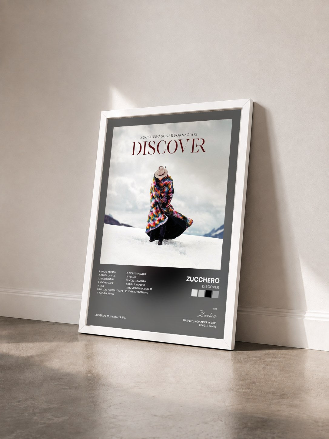 #blanc Tableau de l'album Discover de Zucchero vu de trois quarts, cadre blanc