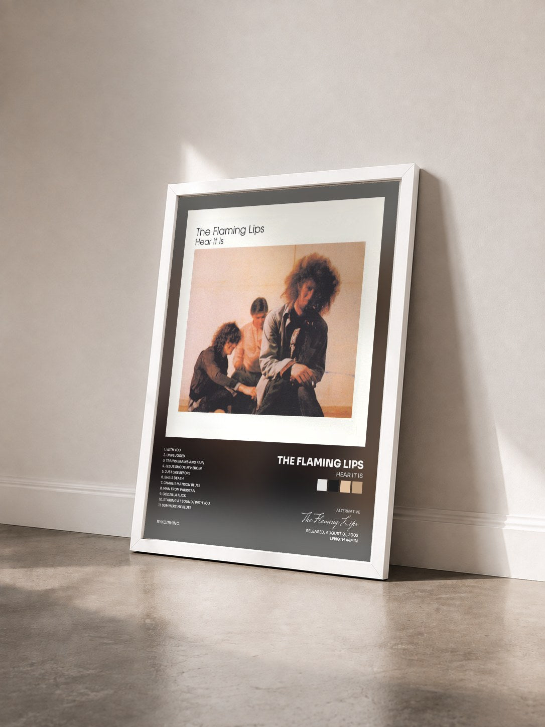 #blanc Tableau de l'album Hear It Is de The Flaming Lips vu de trois quarts, cadre blanc