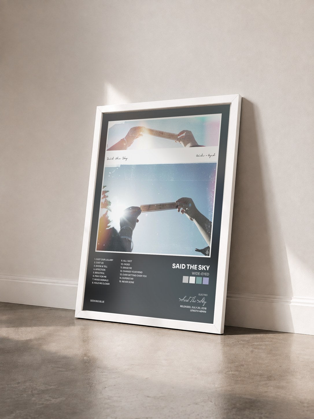 #blanc Tableau de l'album Wide-Eyed de Said The Sky vu de trois quarts, cadre blanc