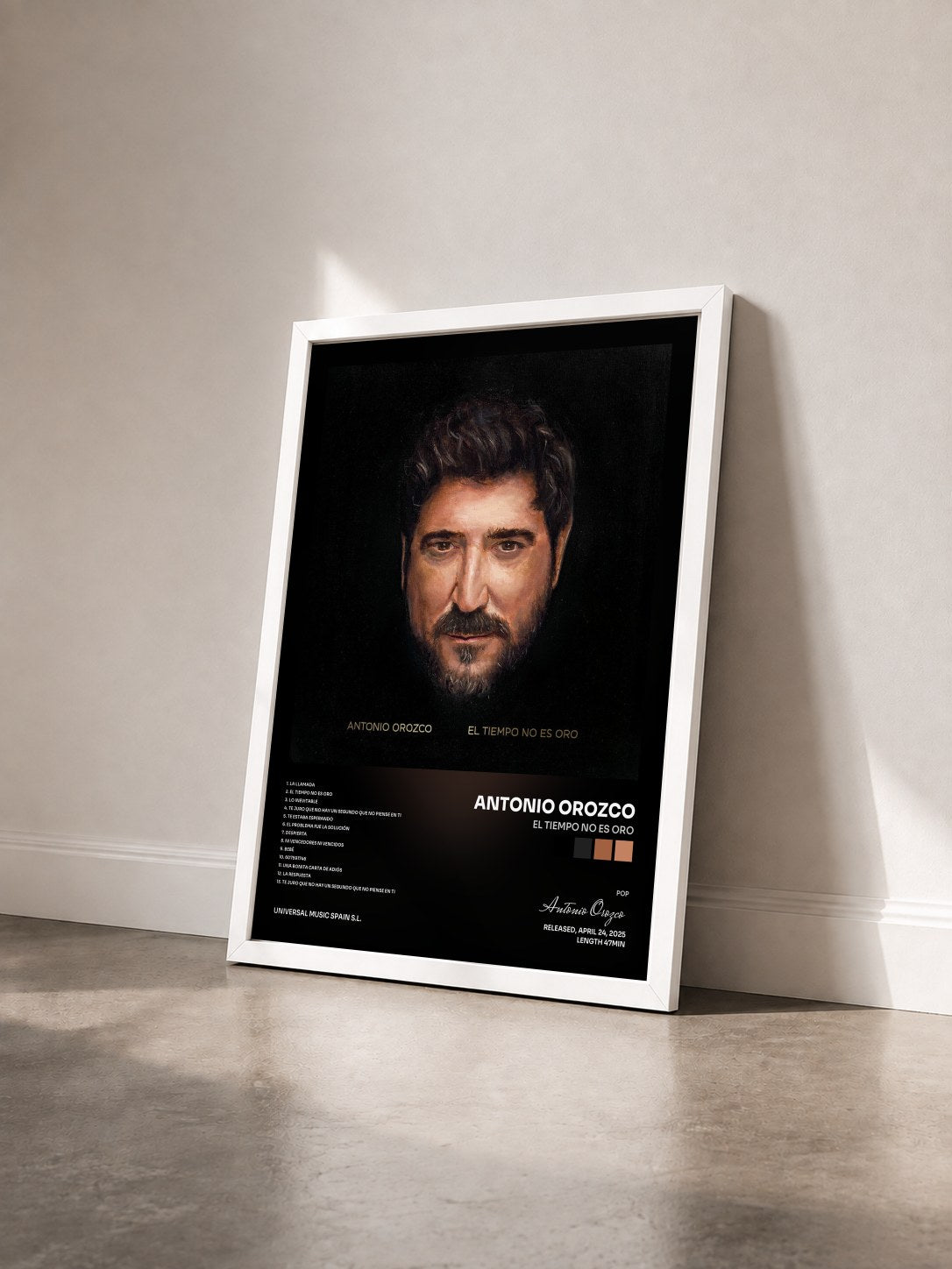 #blanc Tableau de l'album El Tiempo No Es Oro de Antonio Orozco vu de trois quarts, cadre blanc