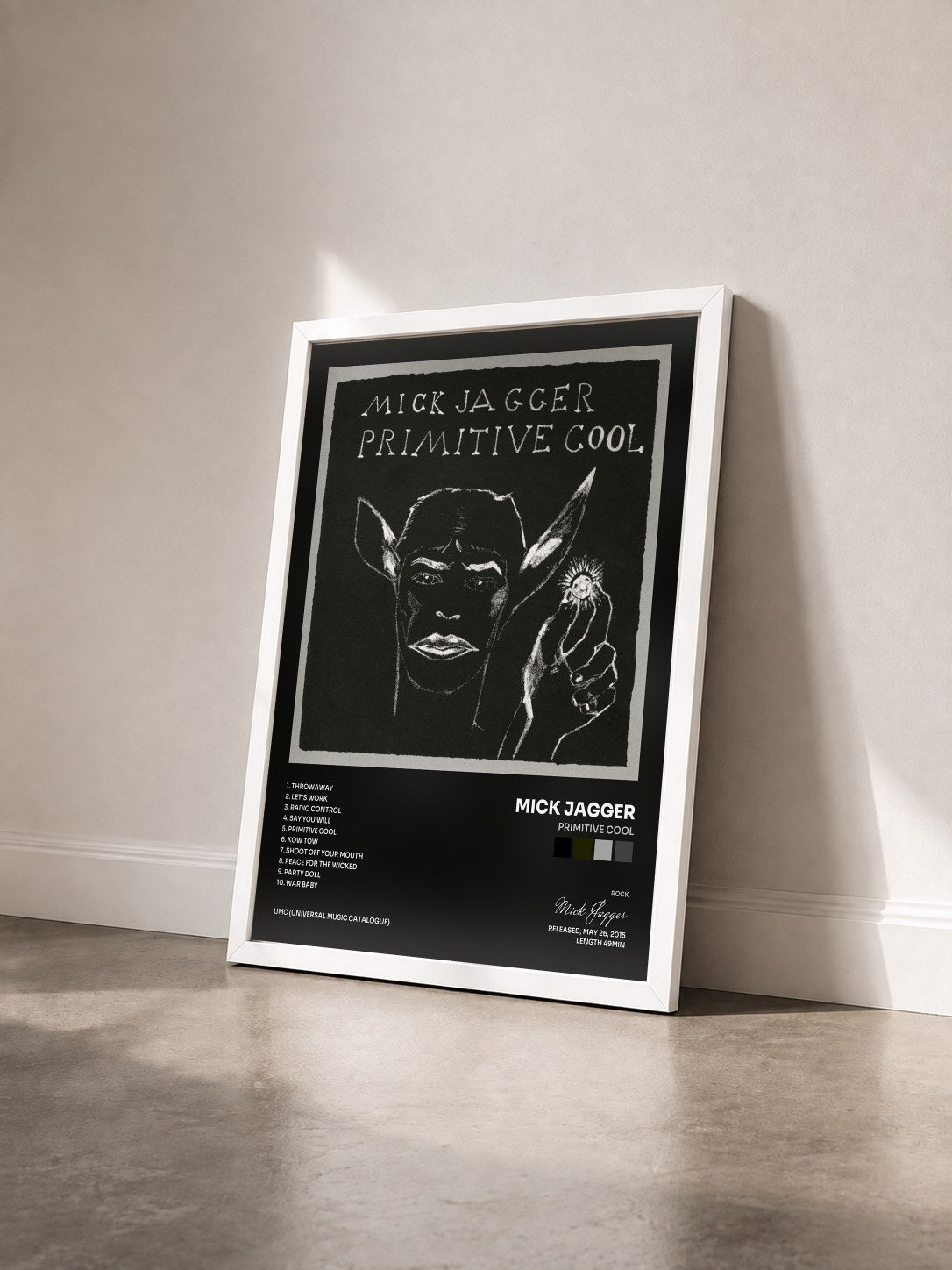 #blanc Tableau de l'album Primitive Cool de Mick Jagger vu de trois quarts, cadre blanc