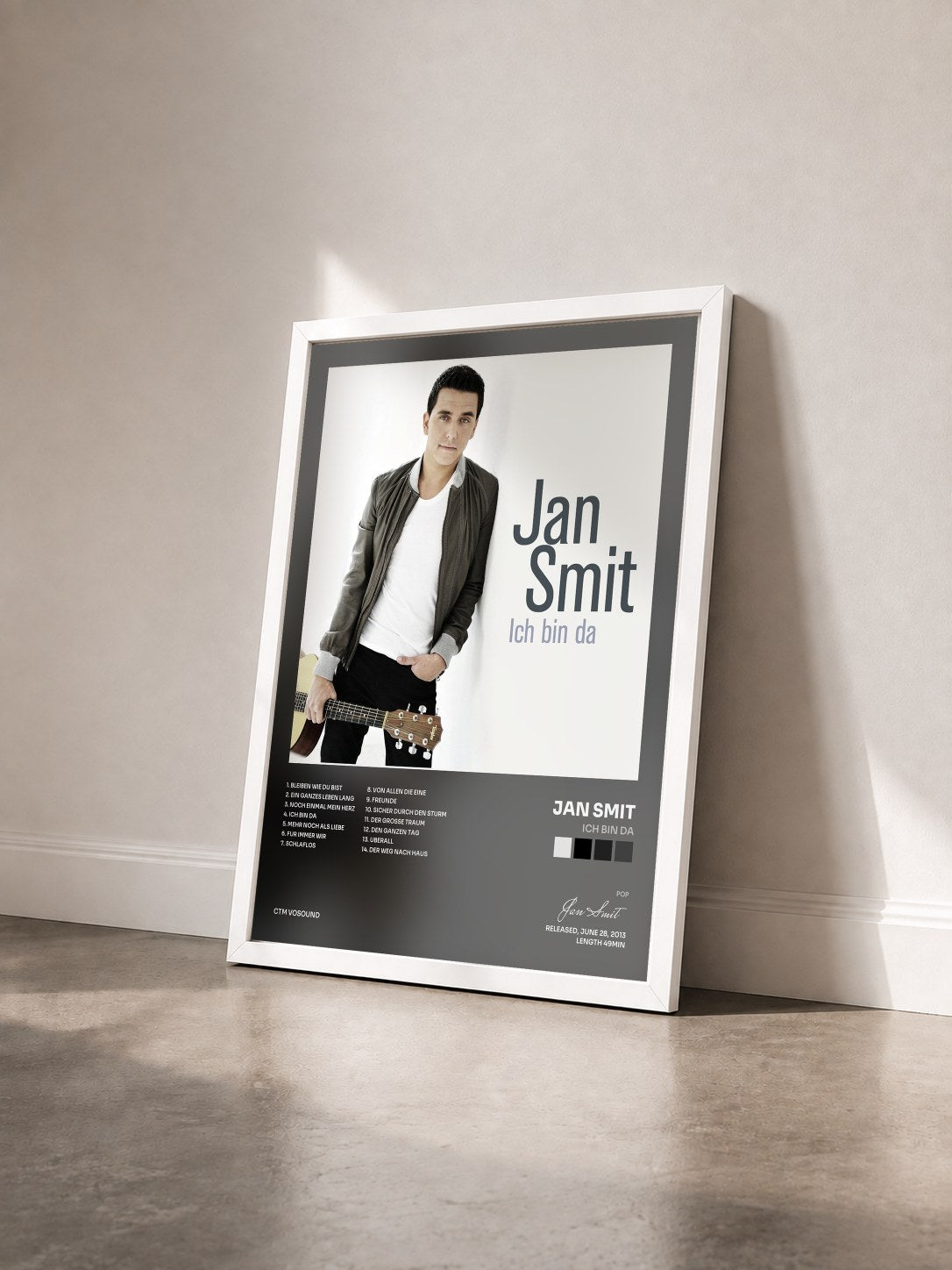 #blanc Tableau de l'album Ich Bin Da de Jan Smit vu de trois quarts, cadre blanc