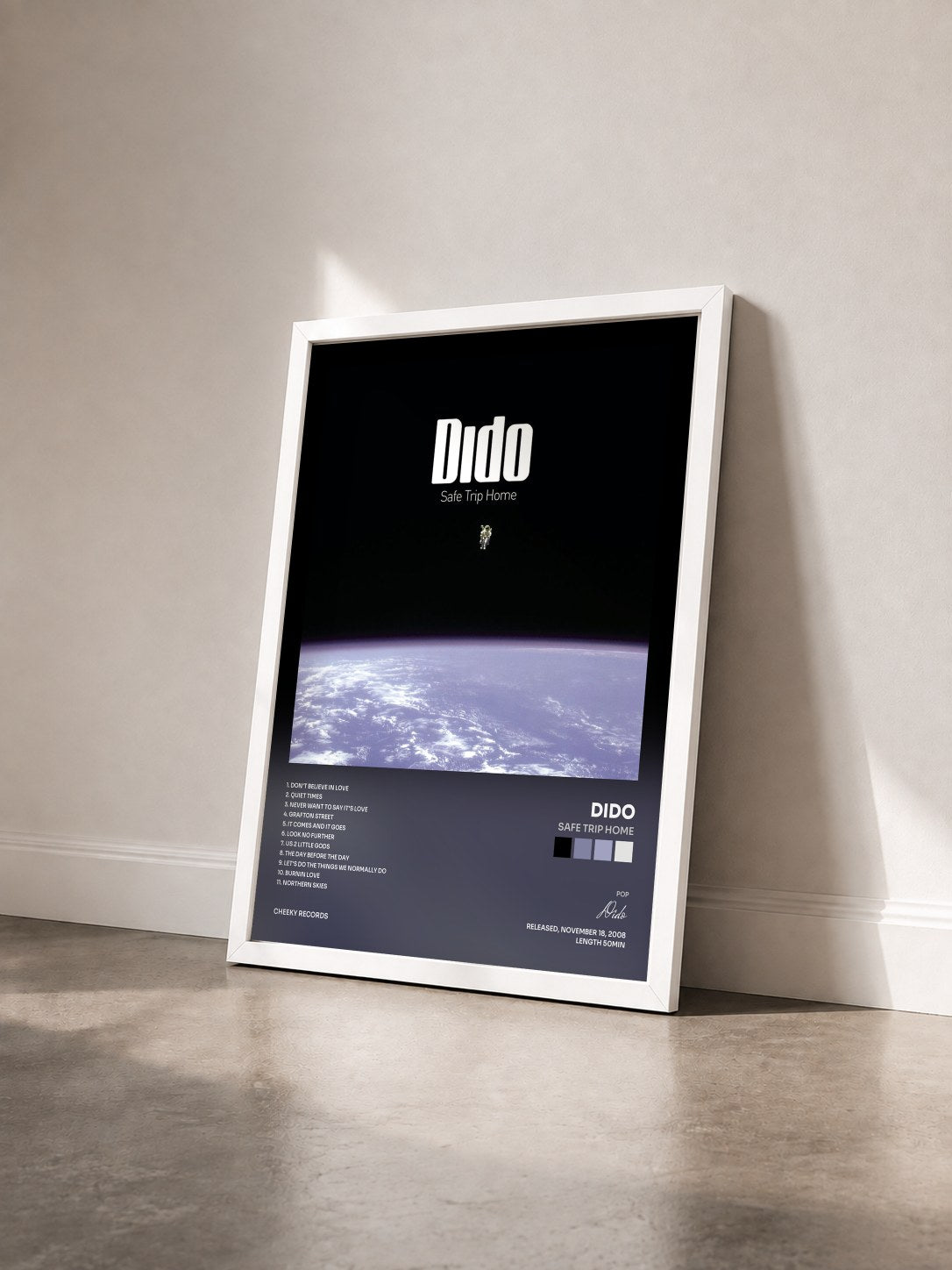 #blanc Tableau de l'album Safe Trip Home de Dido vu de trois quarts, cadre blanc