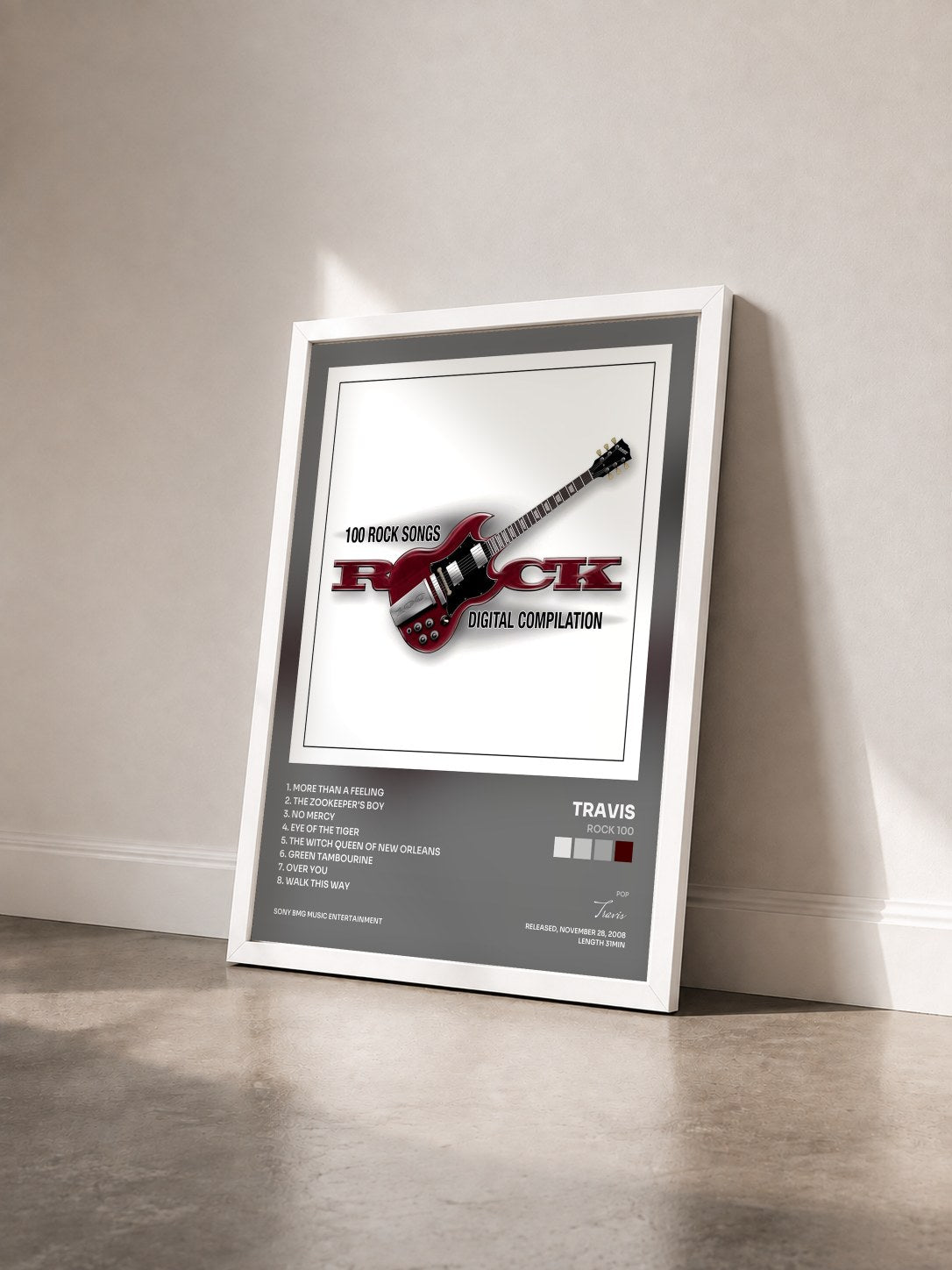 #blanc Tableau de l'album Rock 100 de Travis vu de trois quarts, cadre blanc