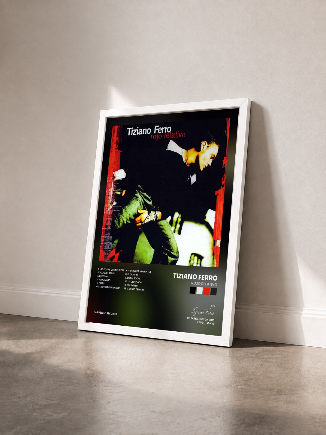 #blanc Tableau de l'album Rojo Relativo de Tiziano Ferro vu de trois quarts, cadre blanc