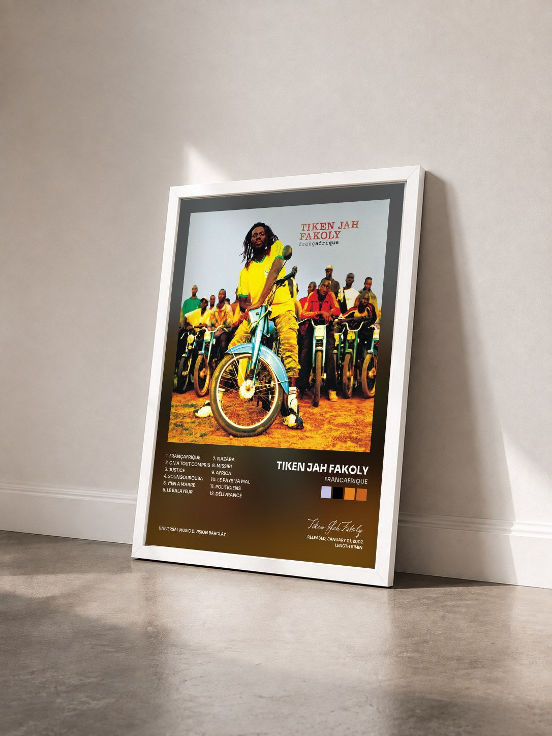 #blanc Tableau de l'album Francafrique de Tiken Jah Fakoly vu de trois quarts, cadre blanc