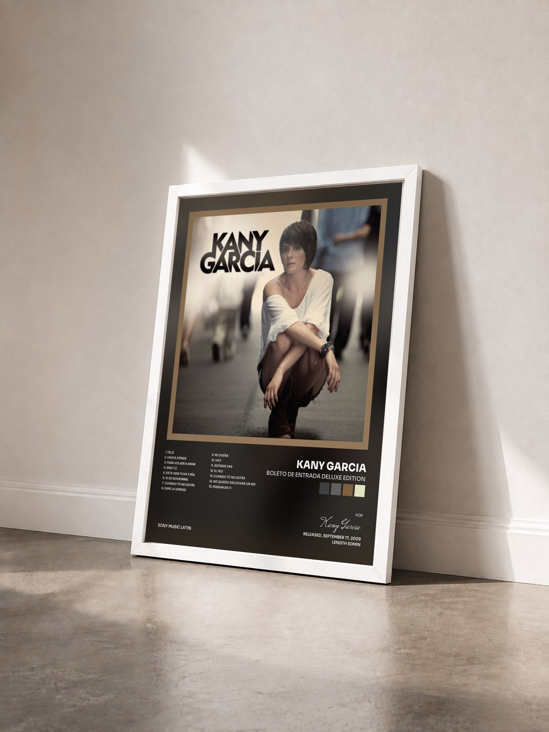#blanc Tableau de l'album Boleto De Entrada Deluxe Edition de Kany Garcia vu de trois quarts, cadre blanc