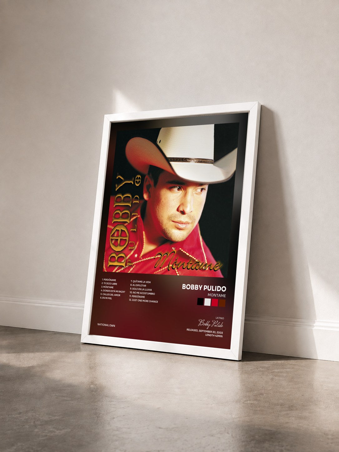 #blanc Tableau de l'album Montame de Bobby Pulido vu de trois quarts, cadre blanc