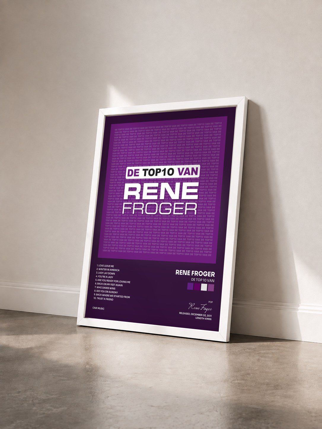 #blanc Tableau de l'album De Top 10 Van de Rene Froger vu de trois quarts, cadre blanc