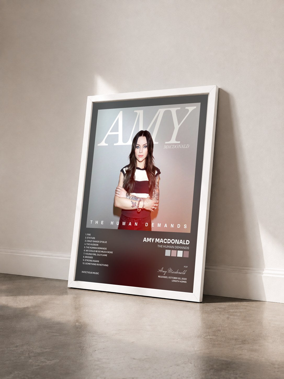 #blanc Tableau de l'album The Human Demands de Amy Macdonald vu de trois quarts, cadre blanc
