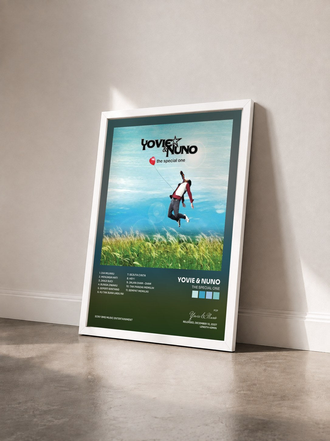 #blanc Tableau de l'album The Special One de Yovie & Nuno vu de trois quarts, cadre blanc