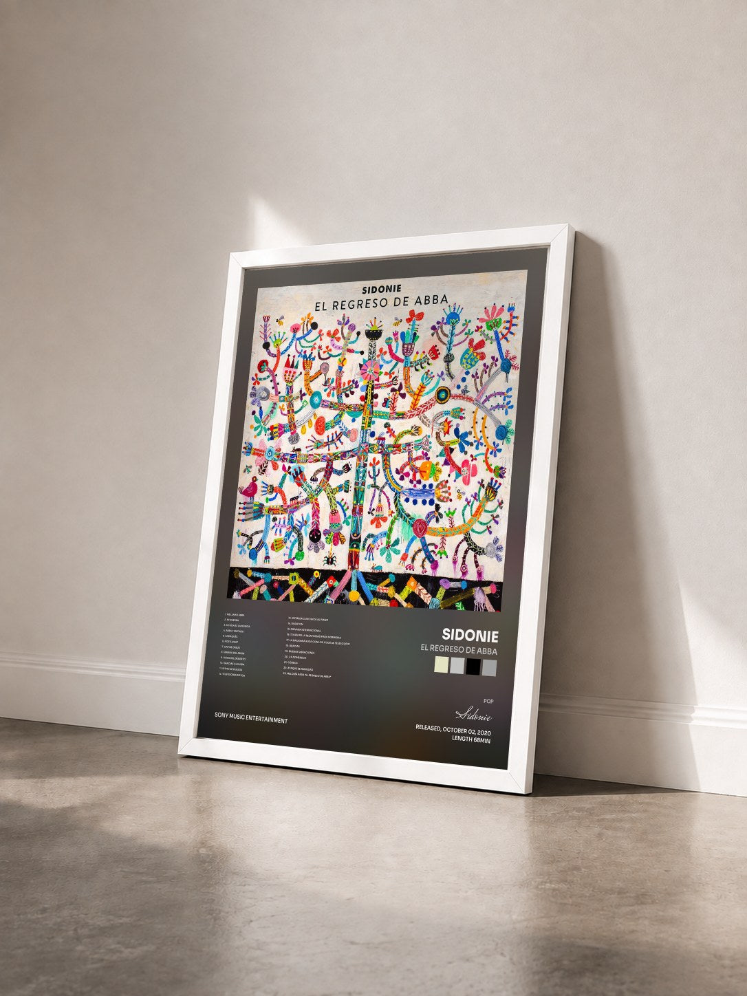 #blanc Tableau de l'album El Regreso de Abba de Sidonie vu de trois quarts, cadre blanc