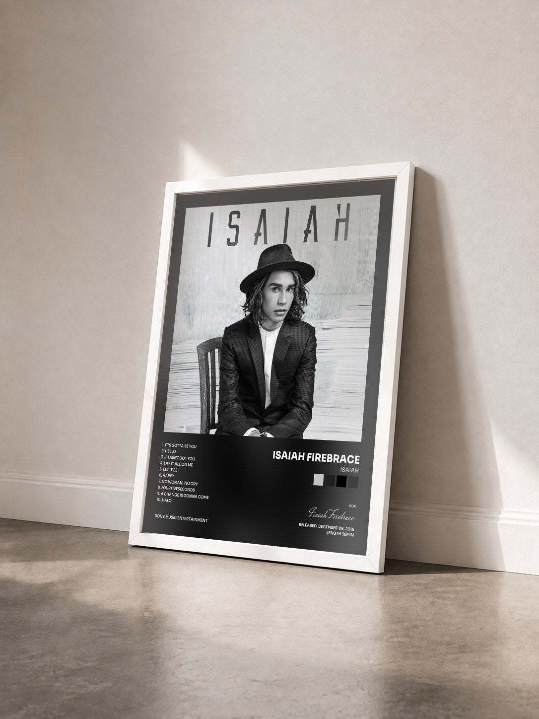 #blanc Tableau de l'album Isaiah de Isaiah Firebrace vu de trois quarts, cadre blanc