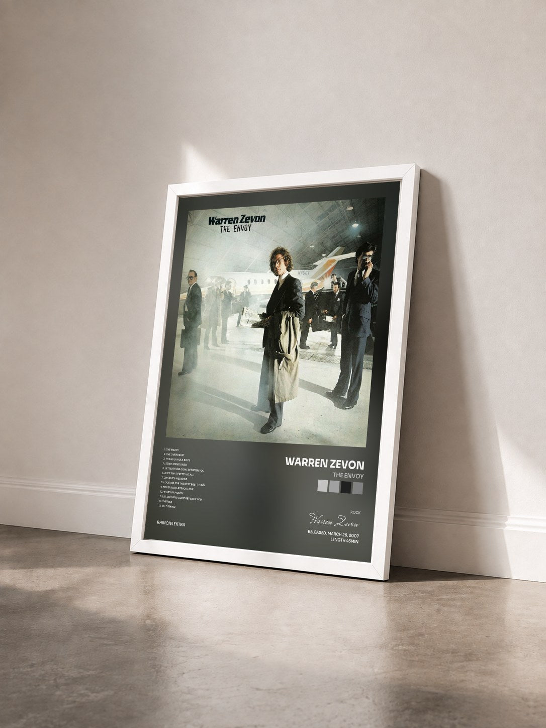 #blanc Tableau de l'album The Envoy de Warren Zevon vu de trois quarts, cadre blanc