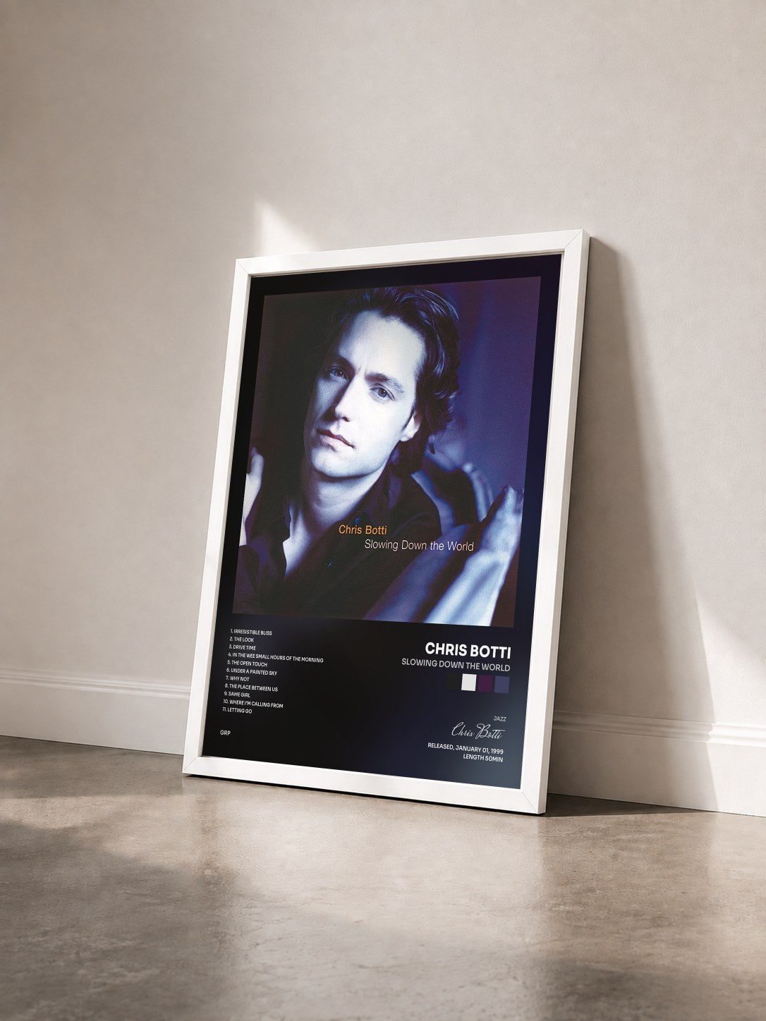 #blanc Tableau de l'album Slowing Down The World de Chris Botti vu de trois quarts, cadre blanc