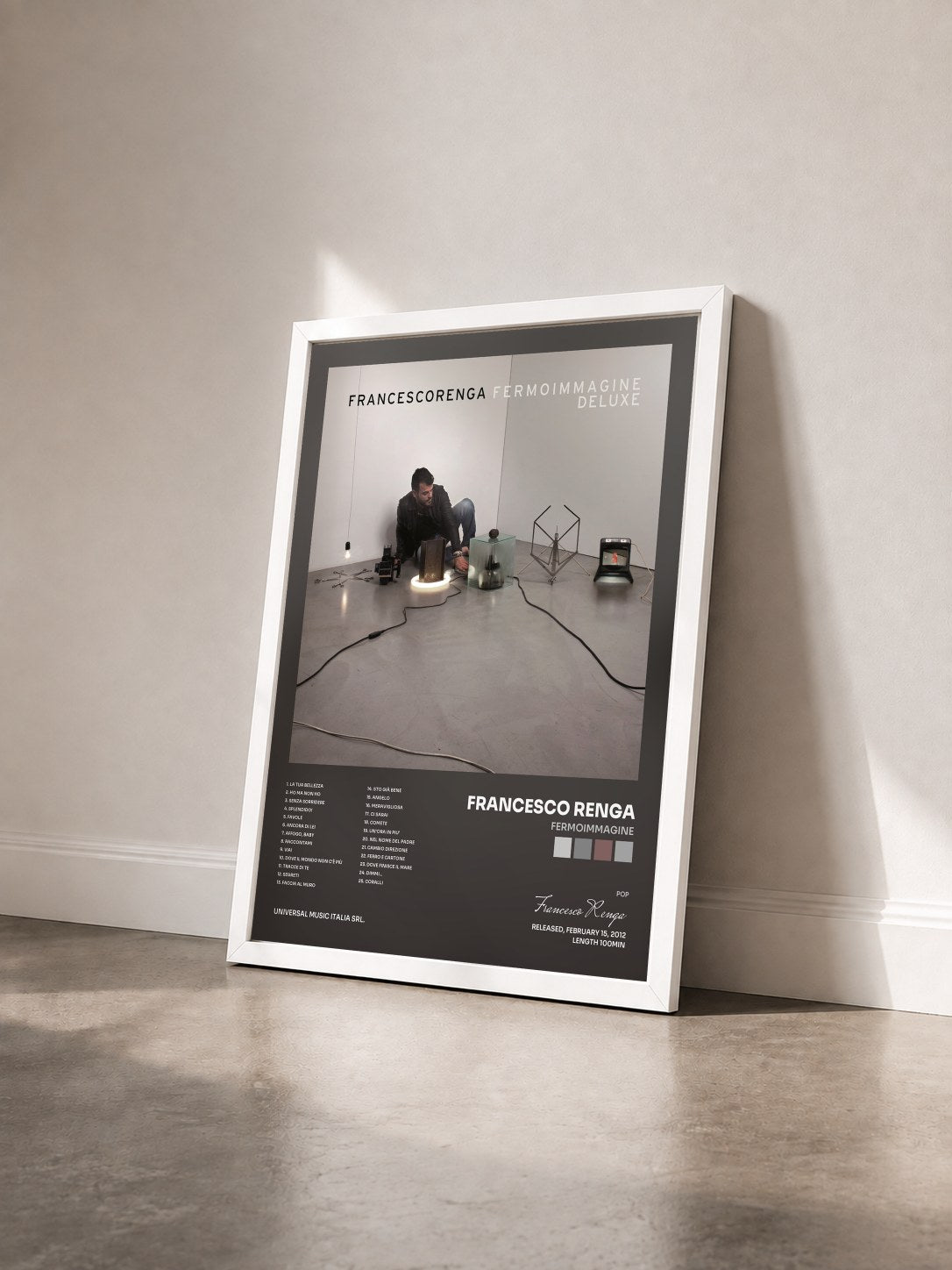 #blanc Tableau de l'album Fermoimmagine de Francesco Renga vu de trois quarts, cadre blanc