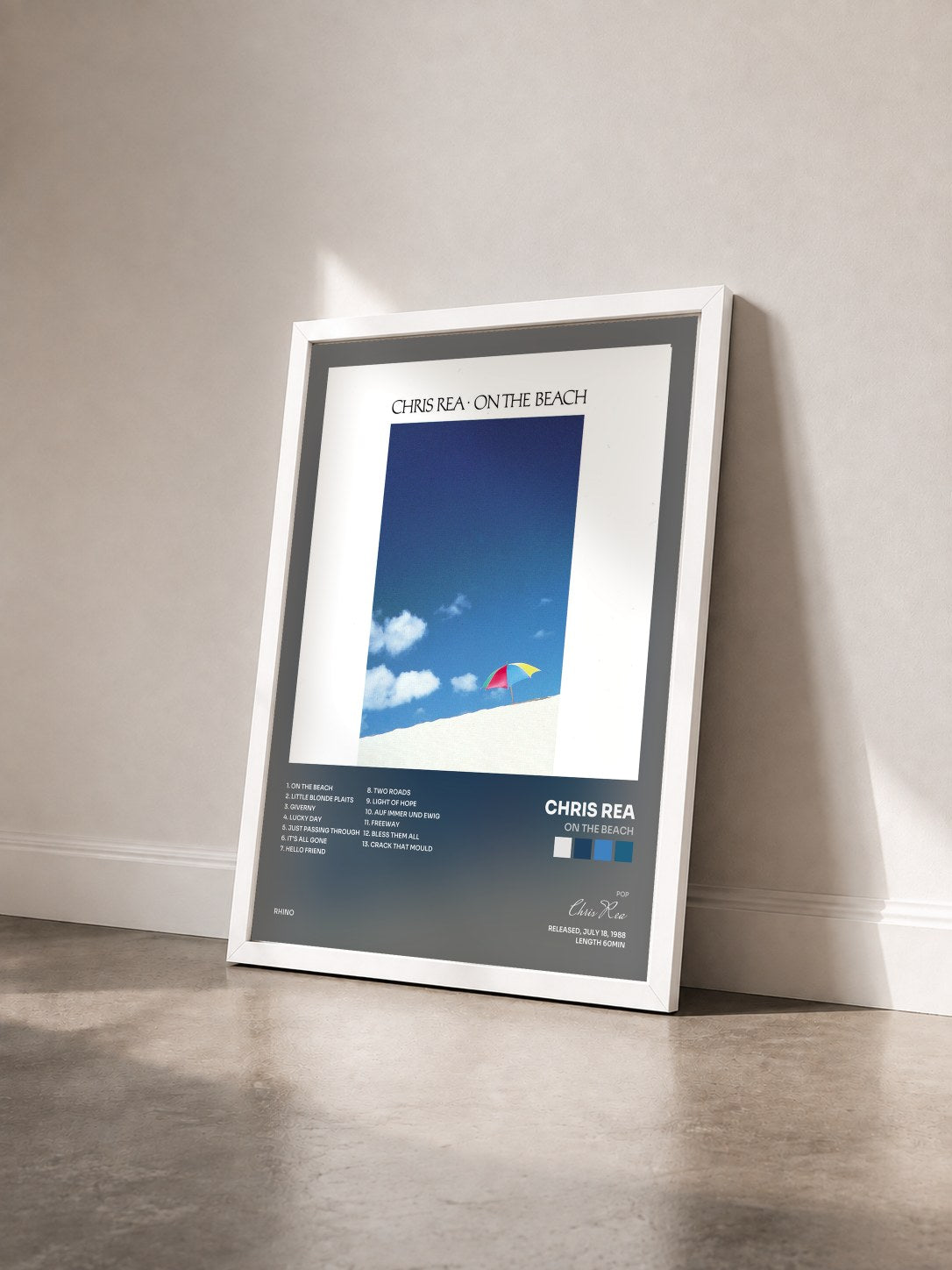 #blanc Tableau de l'album On the Beach de Chris Rea vu de trois quarts, cadre blanc