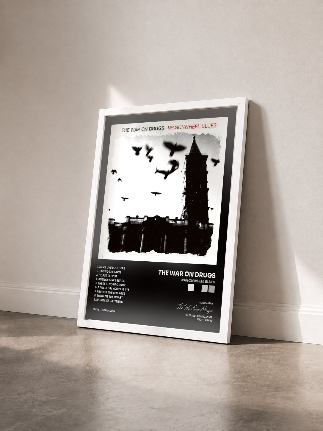 #blanc Tableau de l'album Wagonwheel Blues de The War On Drugs vu de trois quarts, cadre blanc