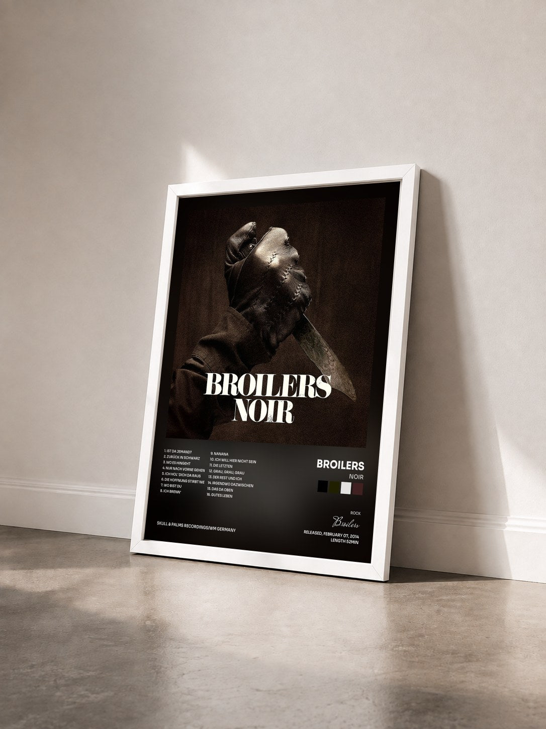 #blanc Tableau de l'album Noir de Broilers vu de trois quarts, cadre blanc
