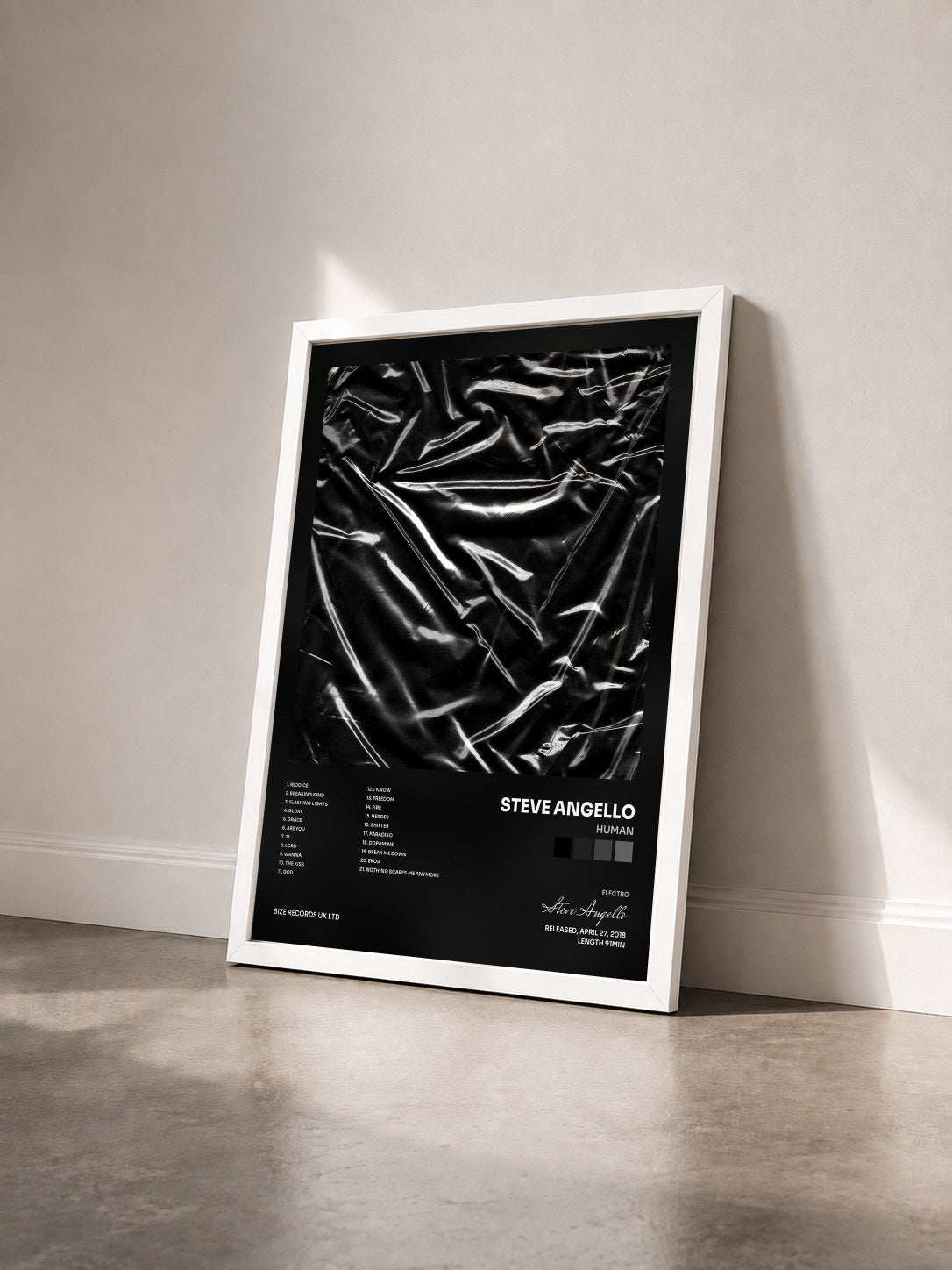 #blanc Tableau de l'album HUMAN de Steve Angello vu de trois quarts, cadre blanc