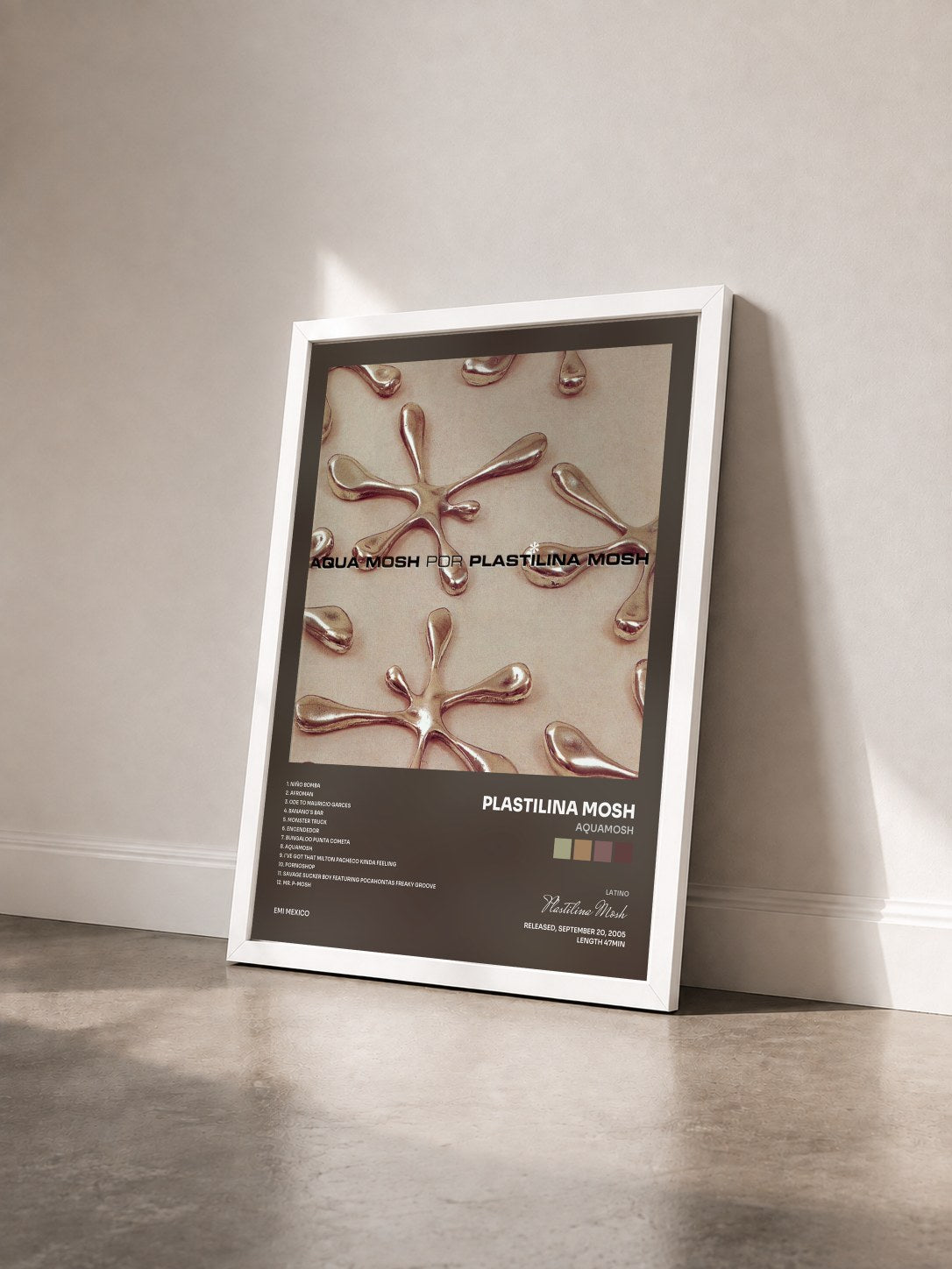 #blanc Tableau de l'album Aquamosh de Plastilina Mosh vu de trois quarts, cadre blanc